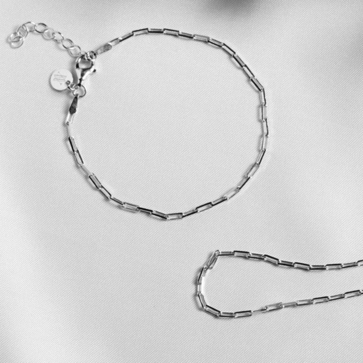 925 sterling silver chain bracelet on white table