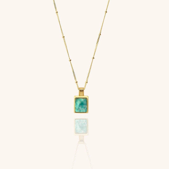 18k gold-plated necklace with a square amazonite blue gemstone pendant on a white background