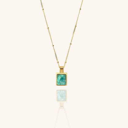 18k gold-plated necklace with a square amazonite blue gemstone pendant on a white background
