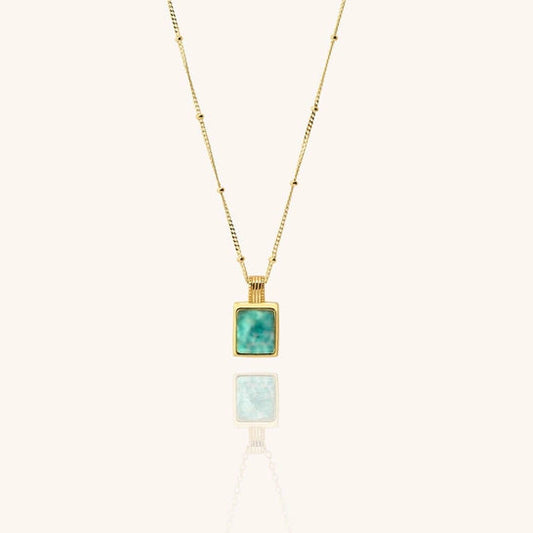 18k gold-plated necklace with a square amazonite blue gemstone pendant on a white background