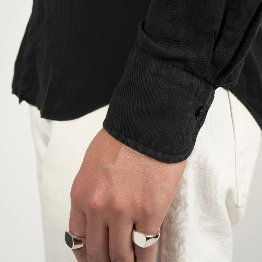 Male model wearing a heavy 925 Sterling Silver Black onyx ring and a 925 sterling silver signet ring