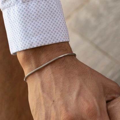 Model wearing a men's 925 sterling silver mamba bracelet