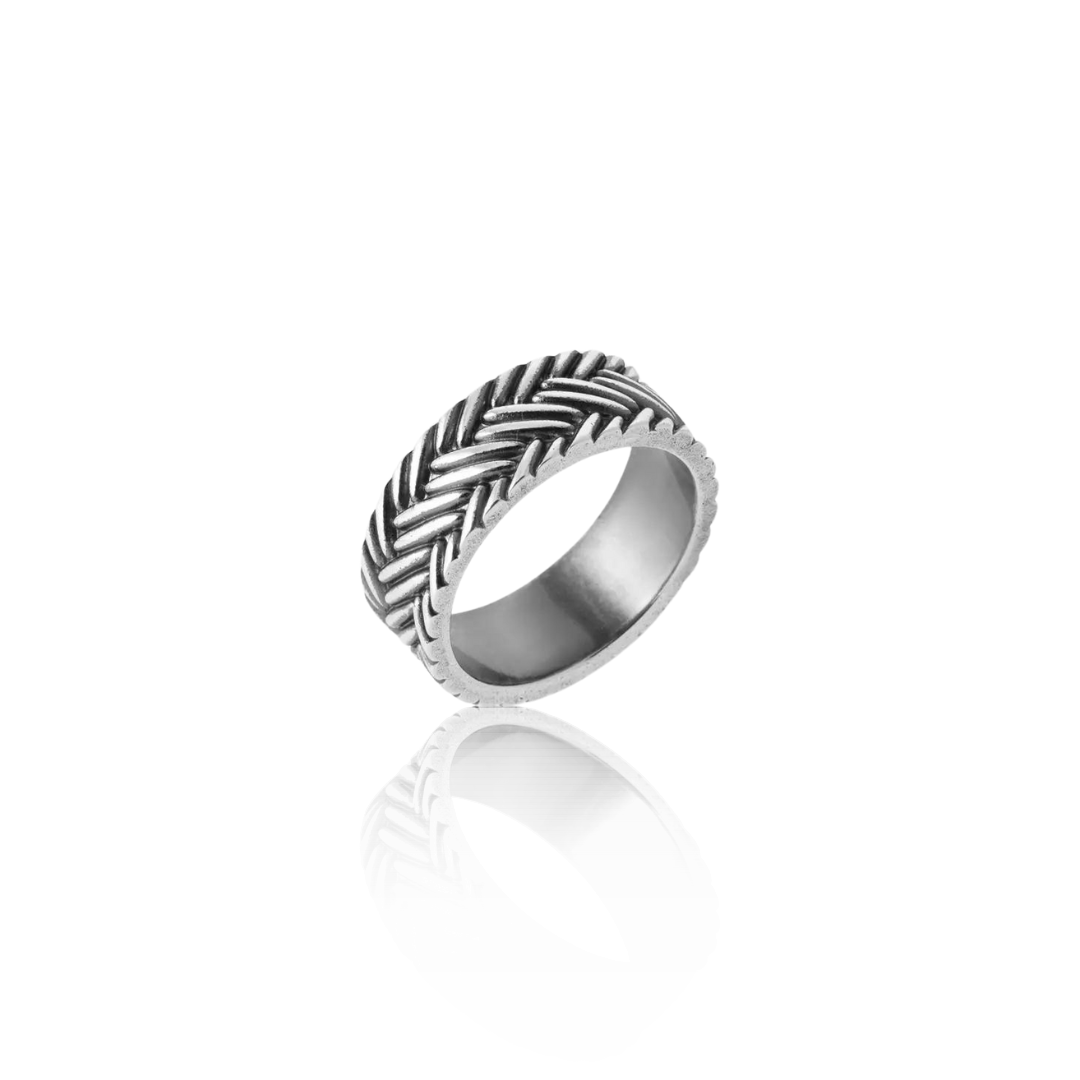 Men's heavy 925 sterling silver echion ring from the side on a white background