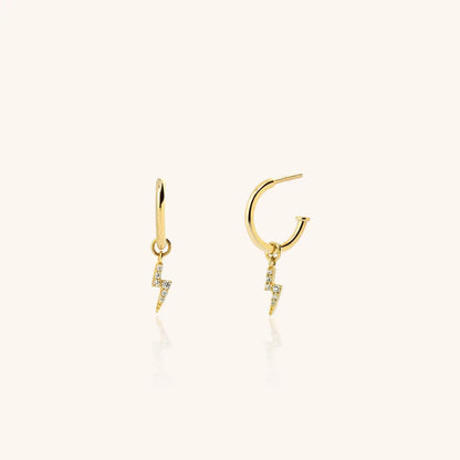 Women's 18k gold plated earrings with lightening bolt on white background